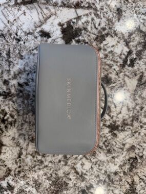 SkinMedica Gray Cosmetic Travel Case with Rose Gold Accents